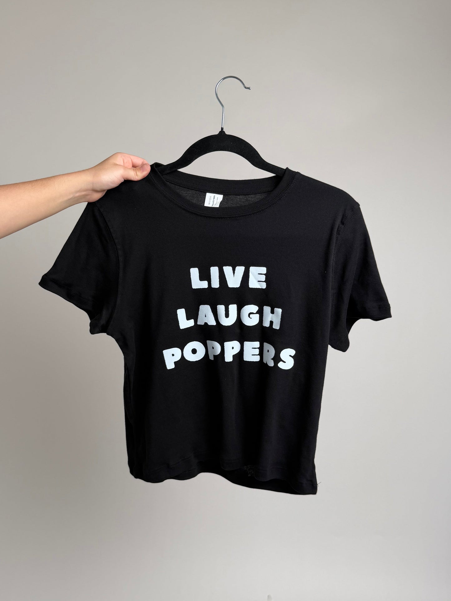 “Live Laugh Poppers” Baby Tee (front design)